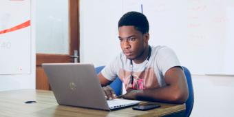 student working at computer
